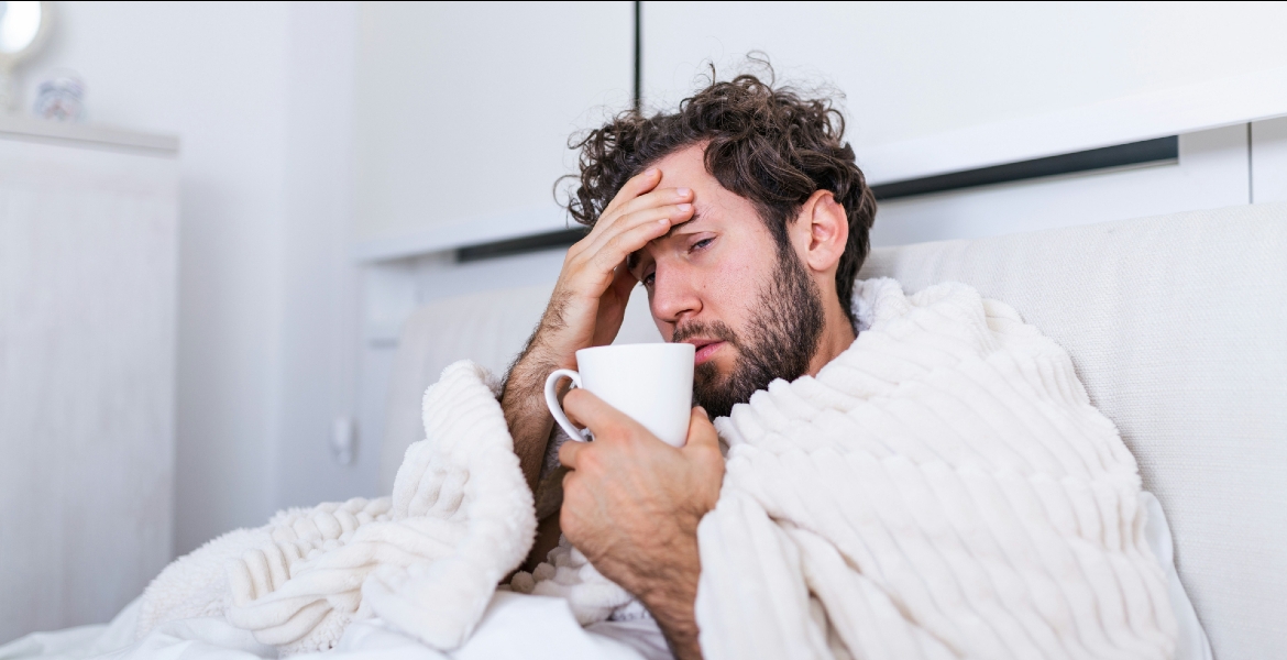 Sick man in bed