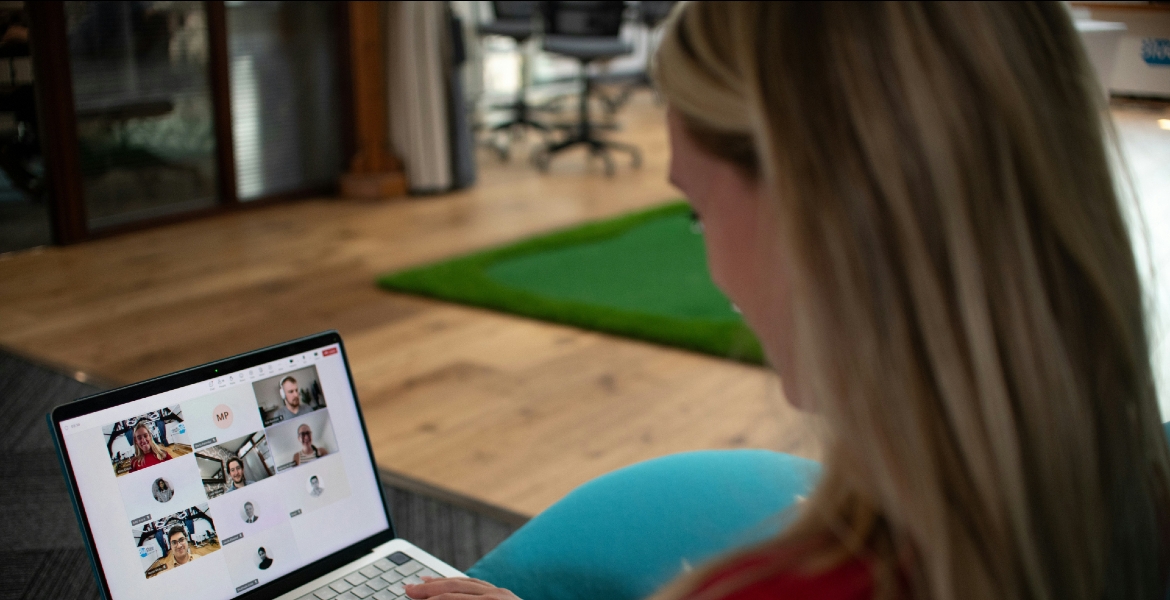 Photograph of a girl working from home on her computer