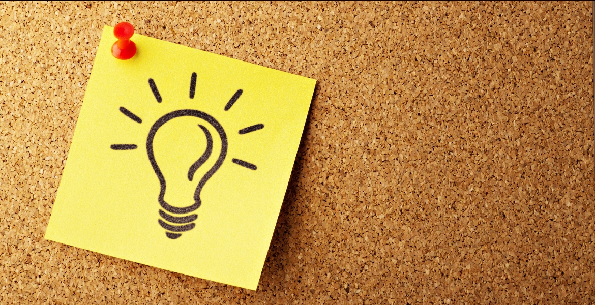 Photo of a post-it note with a light bulb drawn on it
