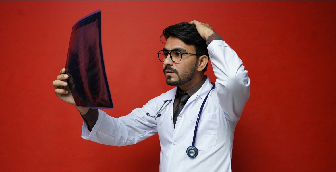 Doctor examining an X-ray