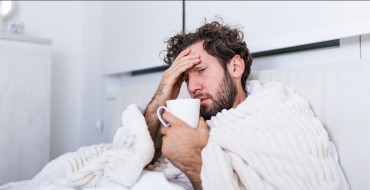Sick man in bed