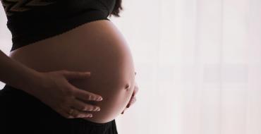Photograph of a pregnant woman's belly